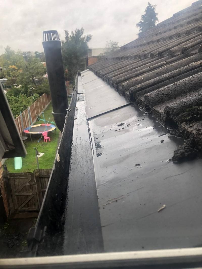 Gutters after clearing — clear and flowing