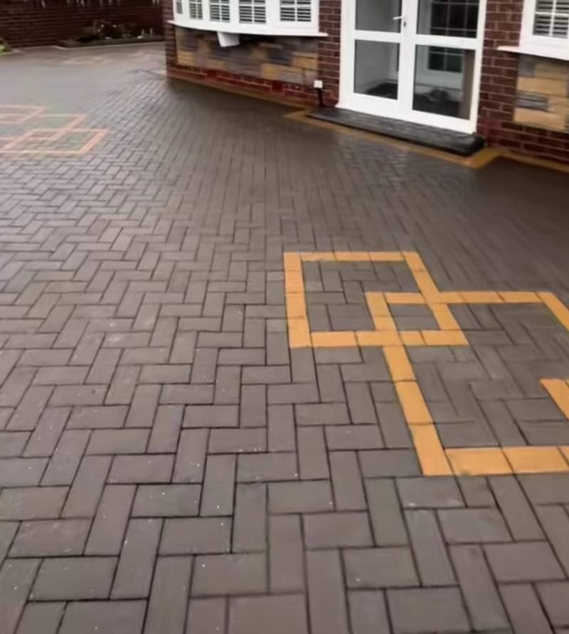 Herringbone driveway after cleaning — spotless