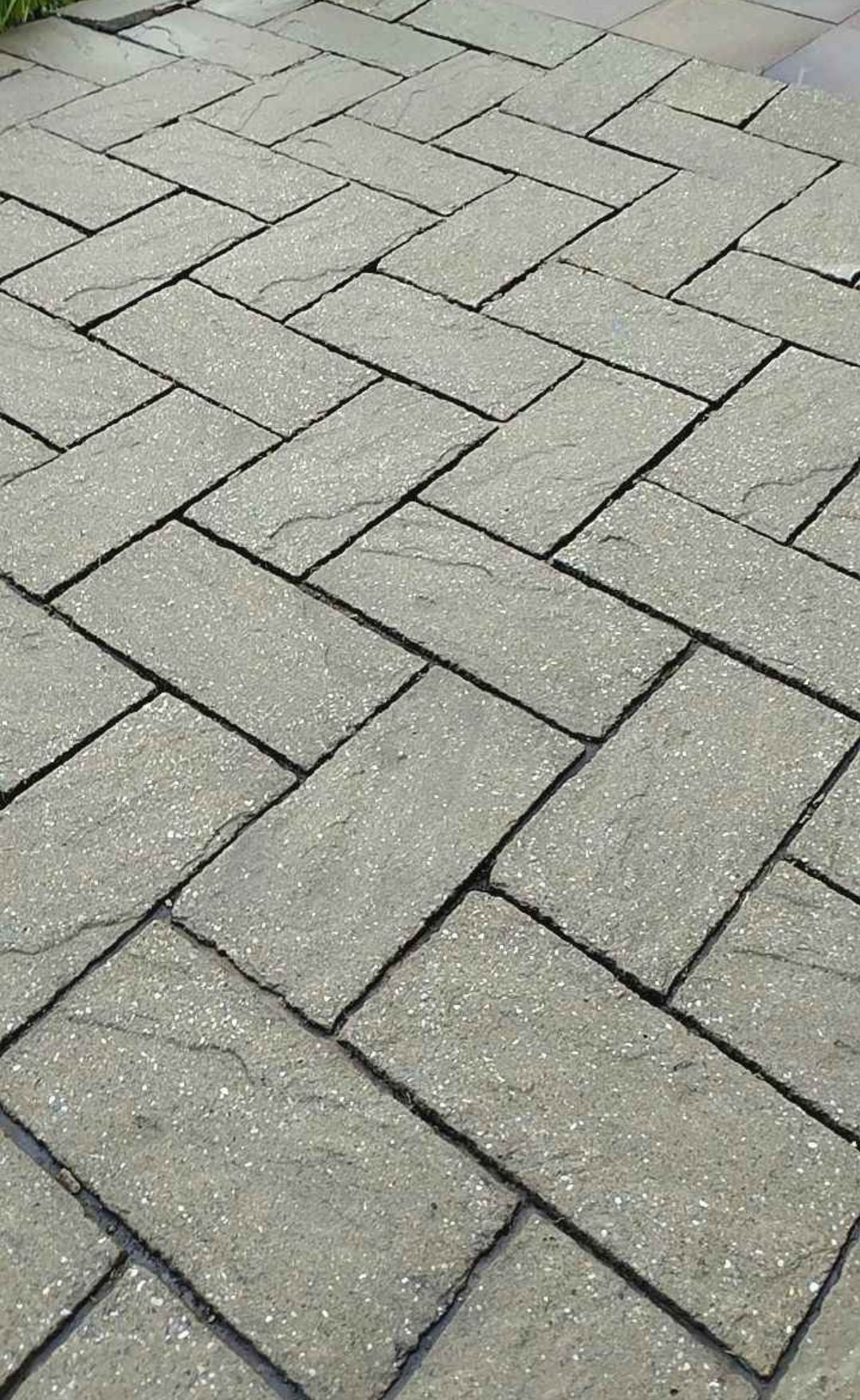 Weathered grey paving cleaned by HR Detail