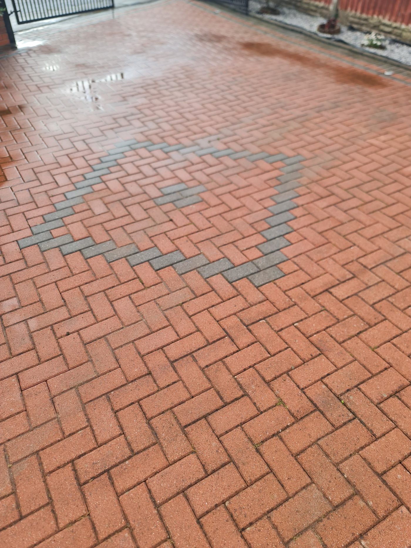 Herringbone driveway with decorative border, cleaned